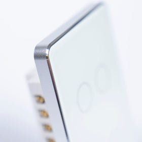 OSH 4 Gang Smart Light Switch white face silver frame detail view